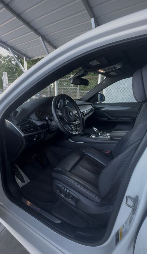 Interior detailing service - vacuumed and conditioned leather seats, BMW, Farmville NC